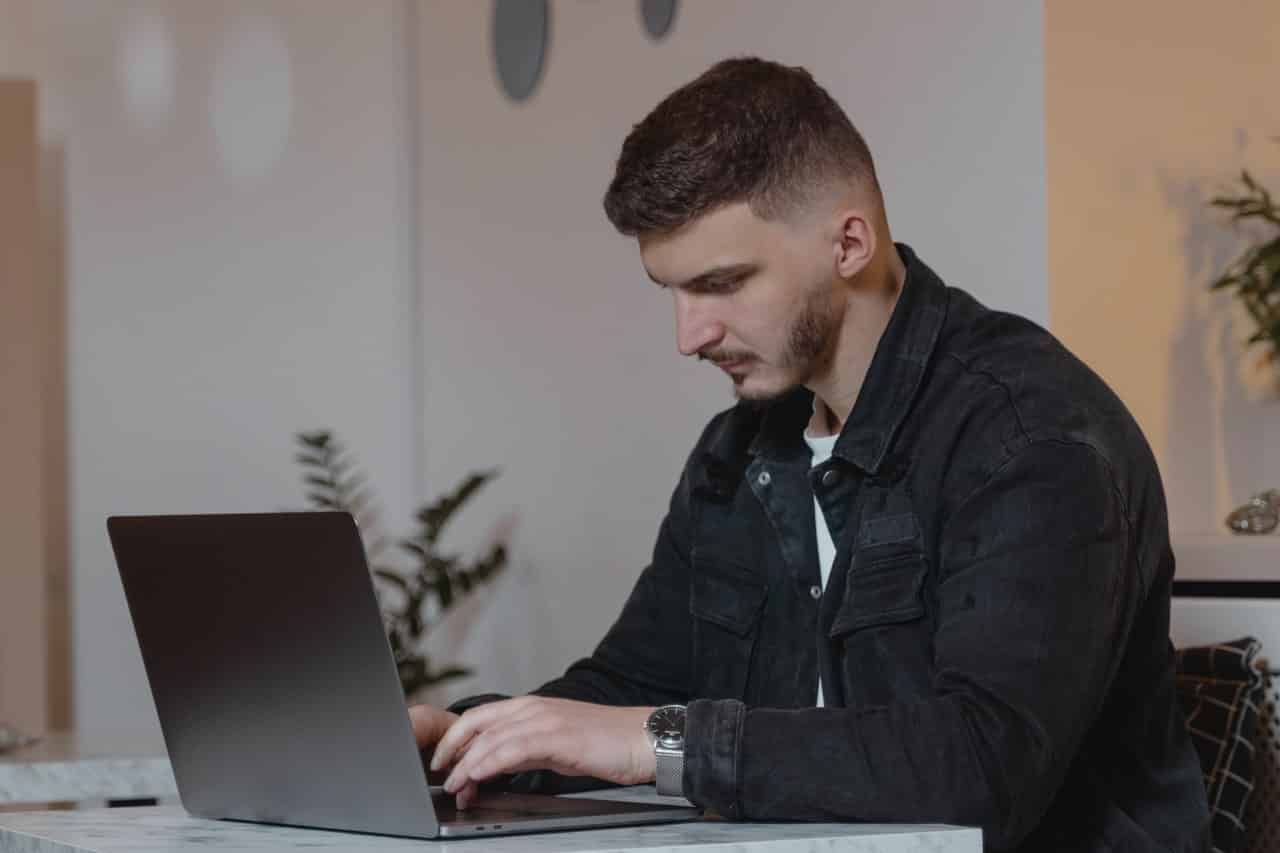 man using laptop